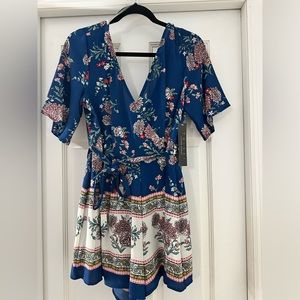 Flowy romper by Trixxi clothing company.